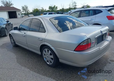 2003 Lincoln Ls V8 z USA, uszkodzony, nr VIN 1LNHM87A13Y659341